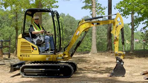 cat mini excavator blade position